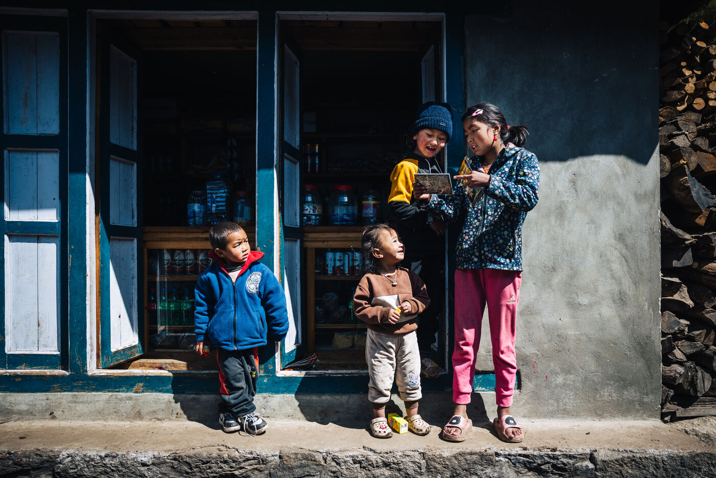 Local children gathered at a trailside shop between Phakding and Namche
