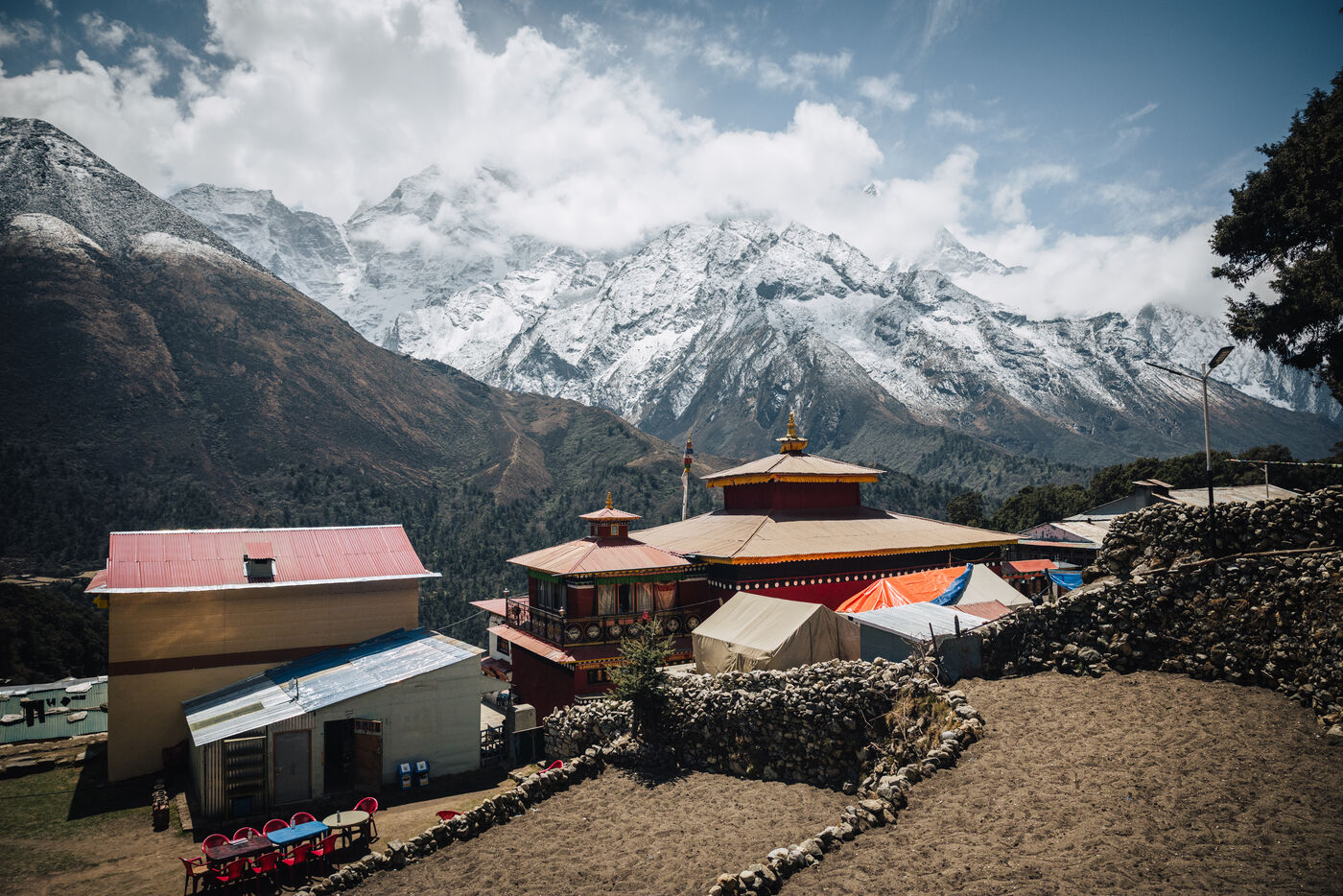 Tengboche Monastery — gold-topped temple and red roofs tucked below snow-draped peaks