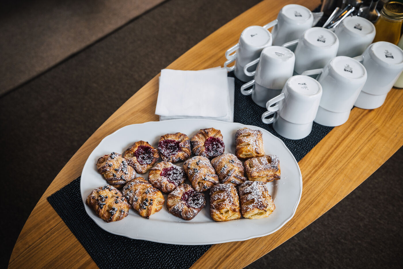 Pastries and coffee cups aboard ship