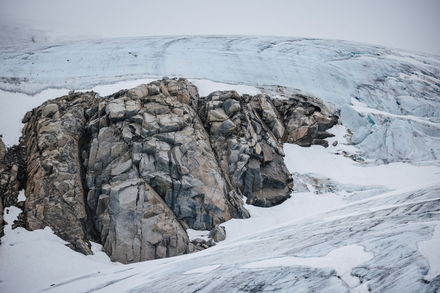 Rocky outcrop emerging from the glacier surface
