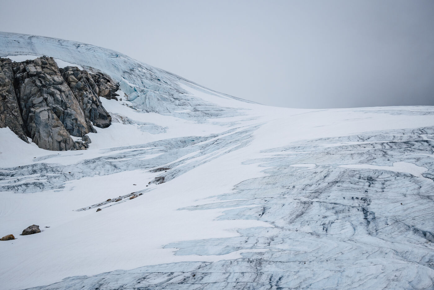 Glacier beneath snowfields and peaks