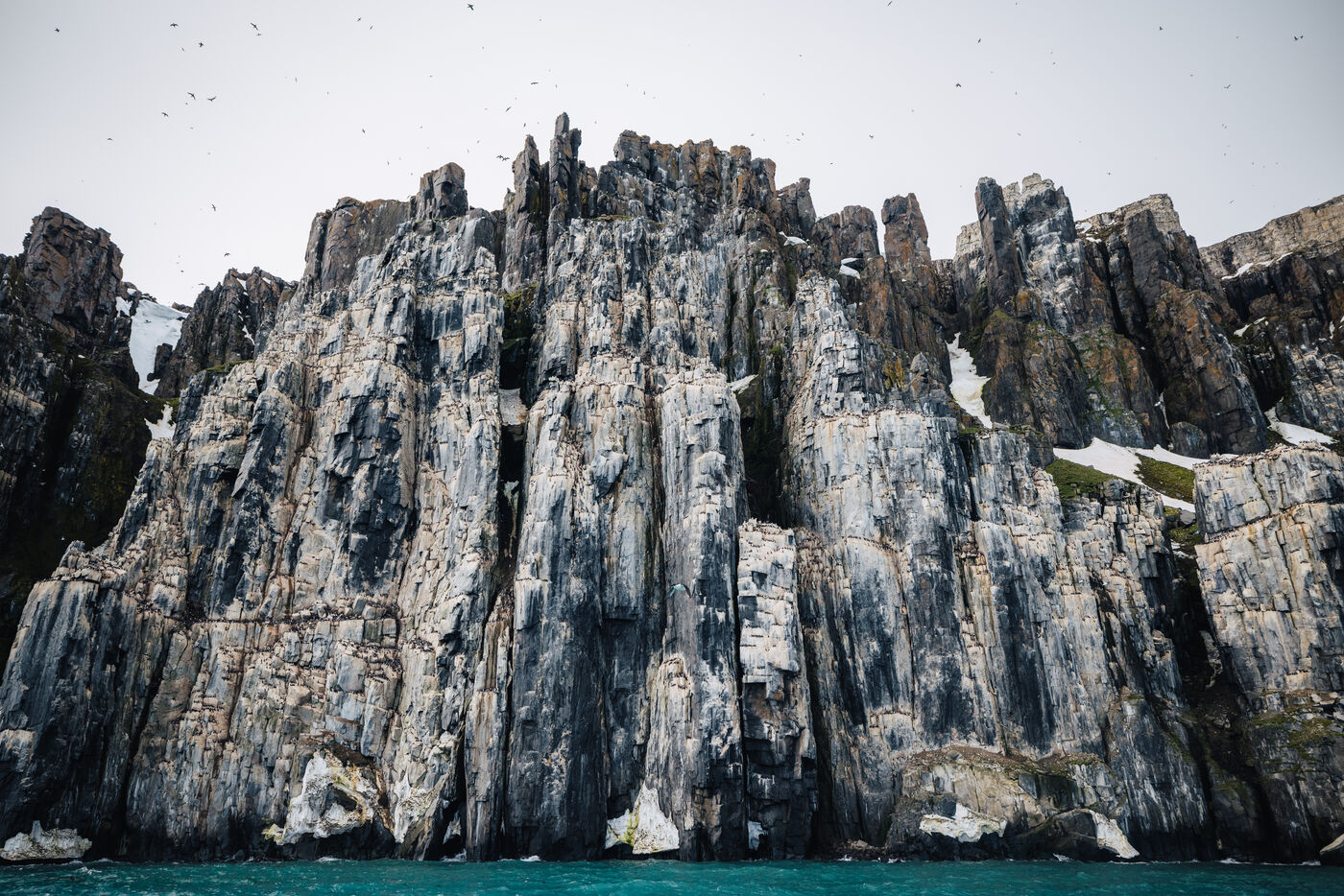 Alkefjellet basalt cliffs with thousands of seabirds
