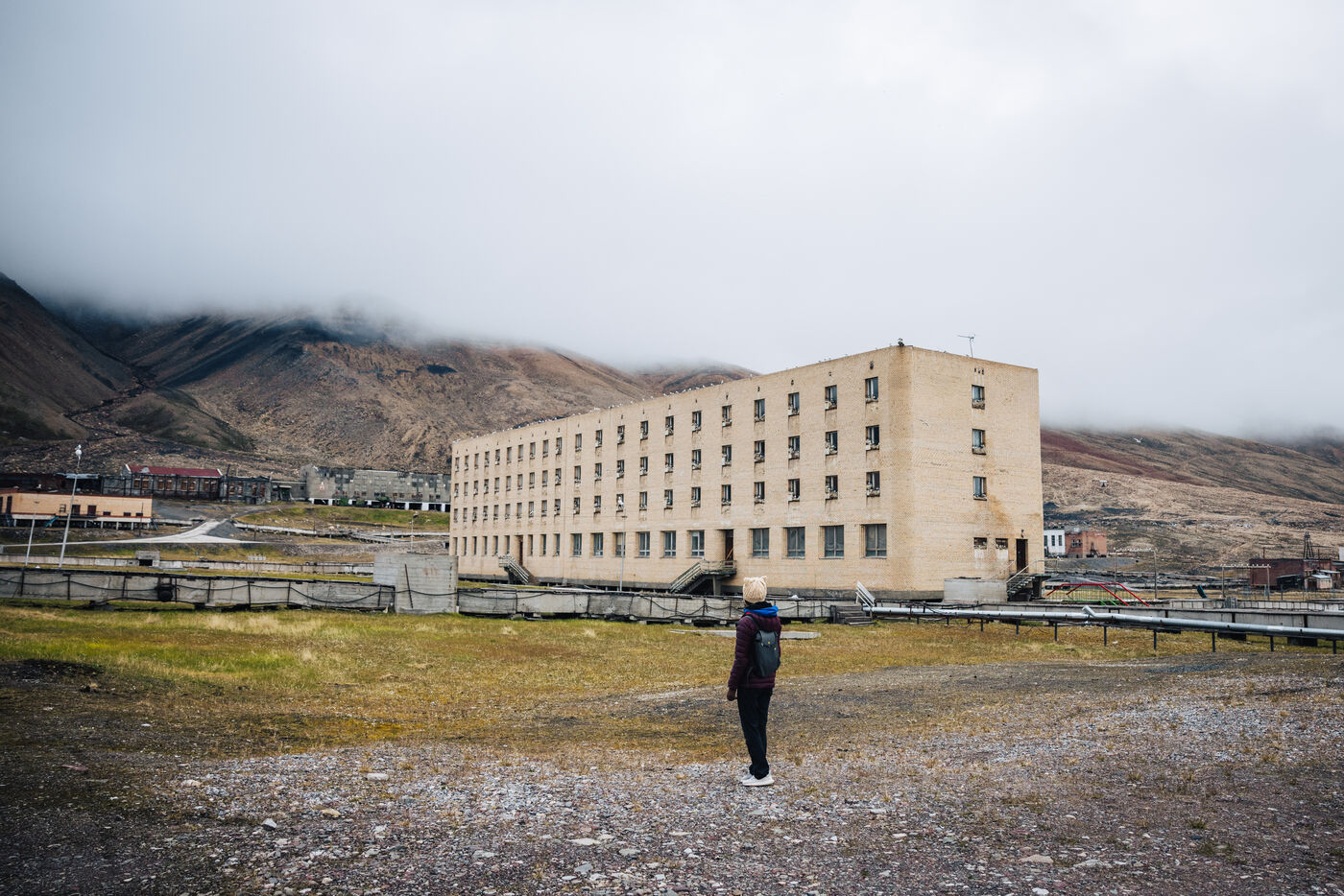Wide view of residential building with mountain
