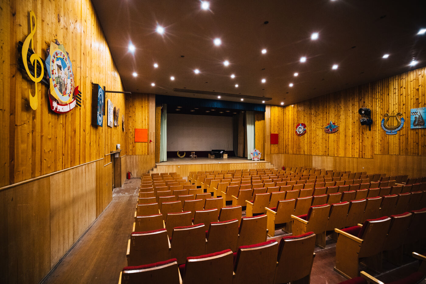 Cinema interior with empty wooden seats
