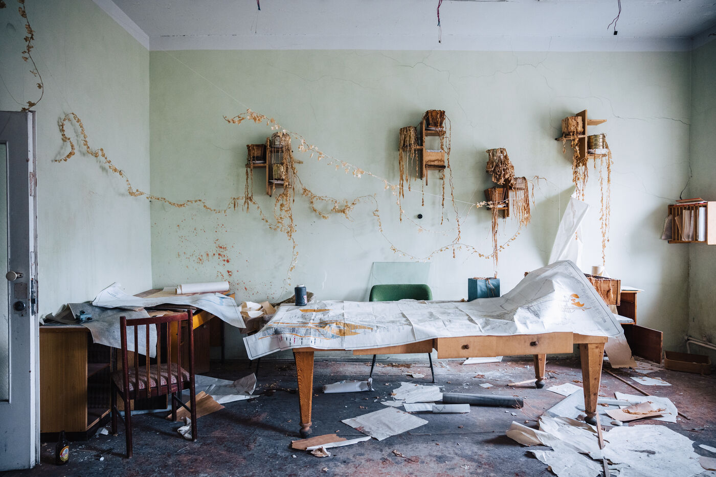 More interior rooms with peeling wallpaper