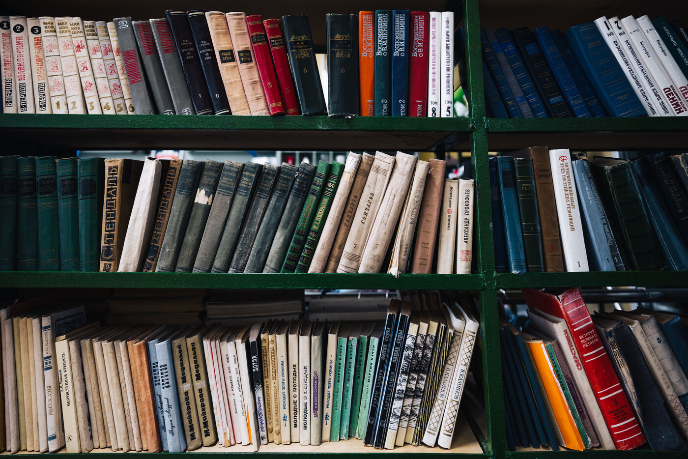 Shelves of books and records in library