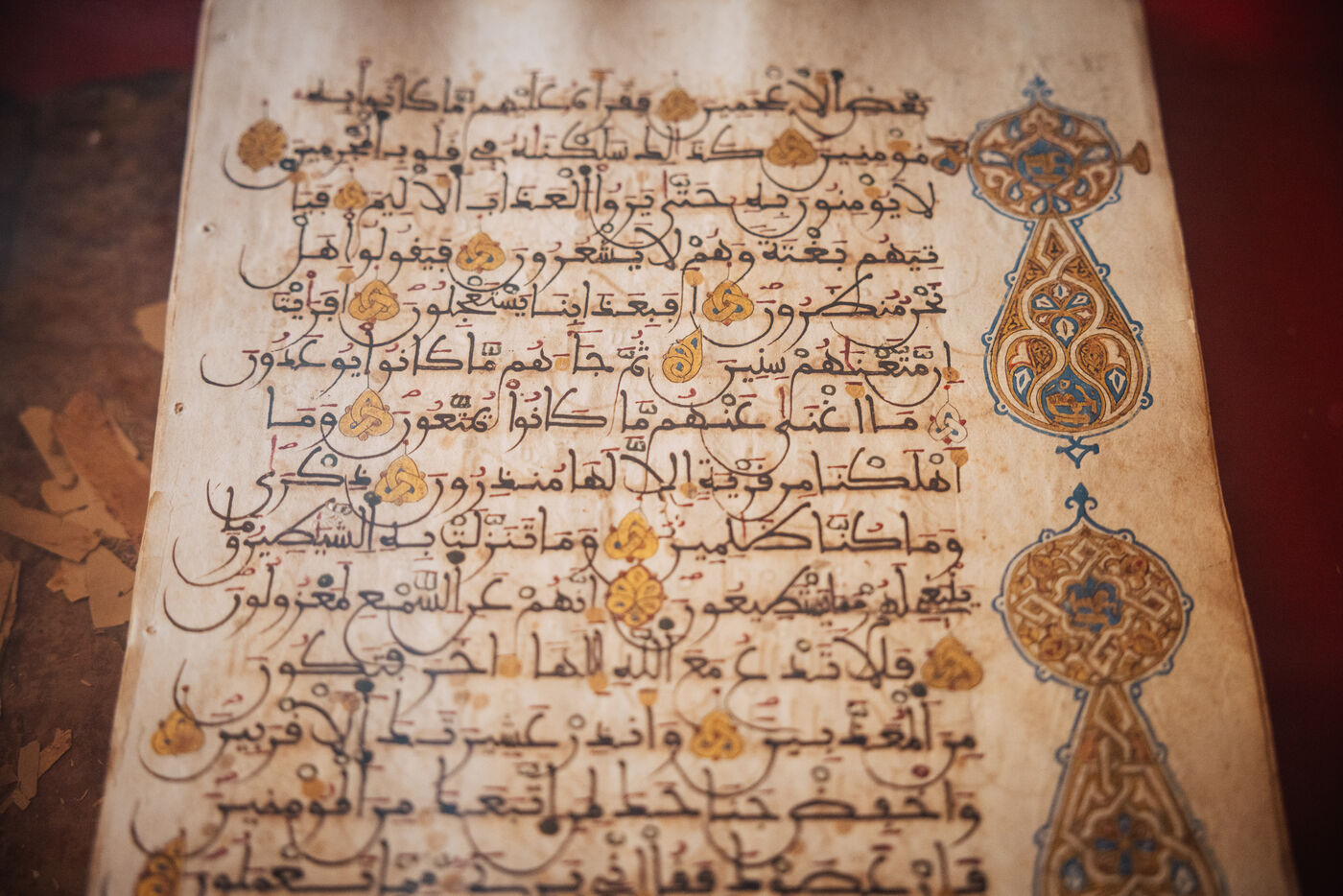 Illuminated manuscript page with gold and blue ornamentation