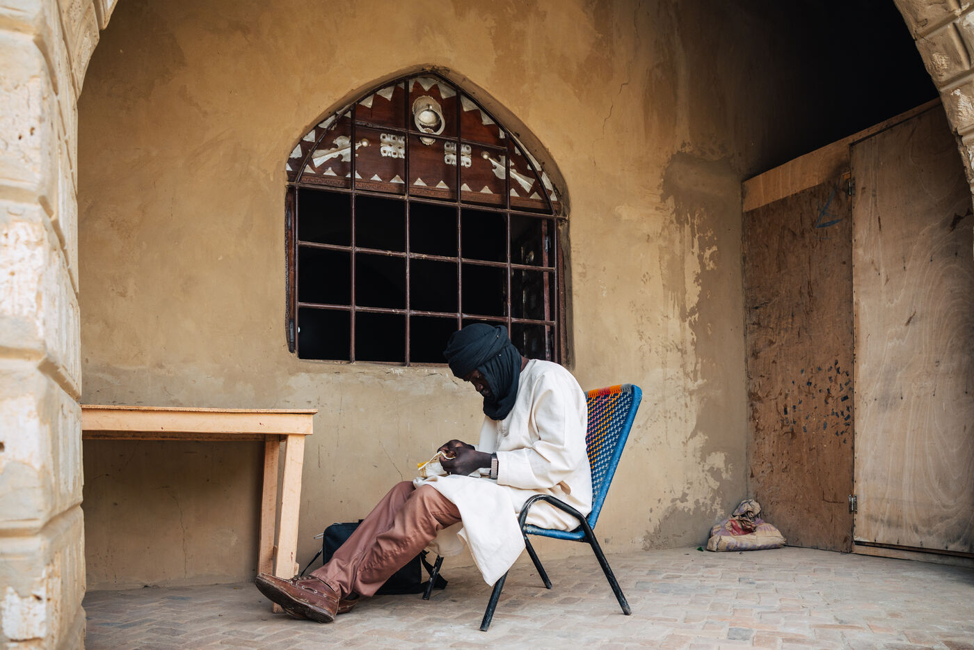 Man sitting in chair relaxing