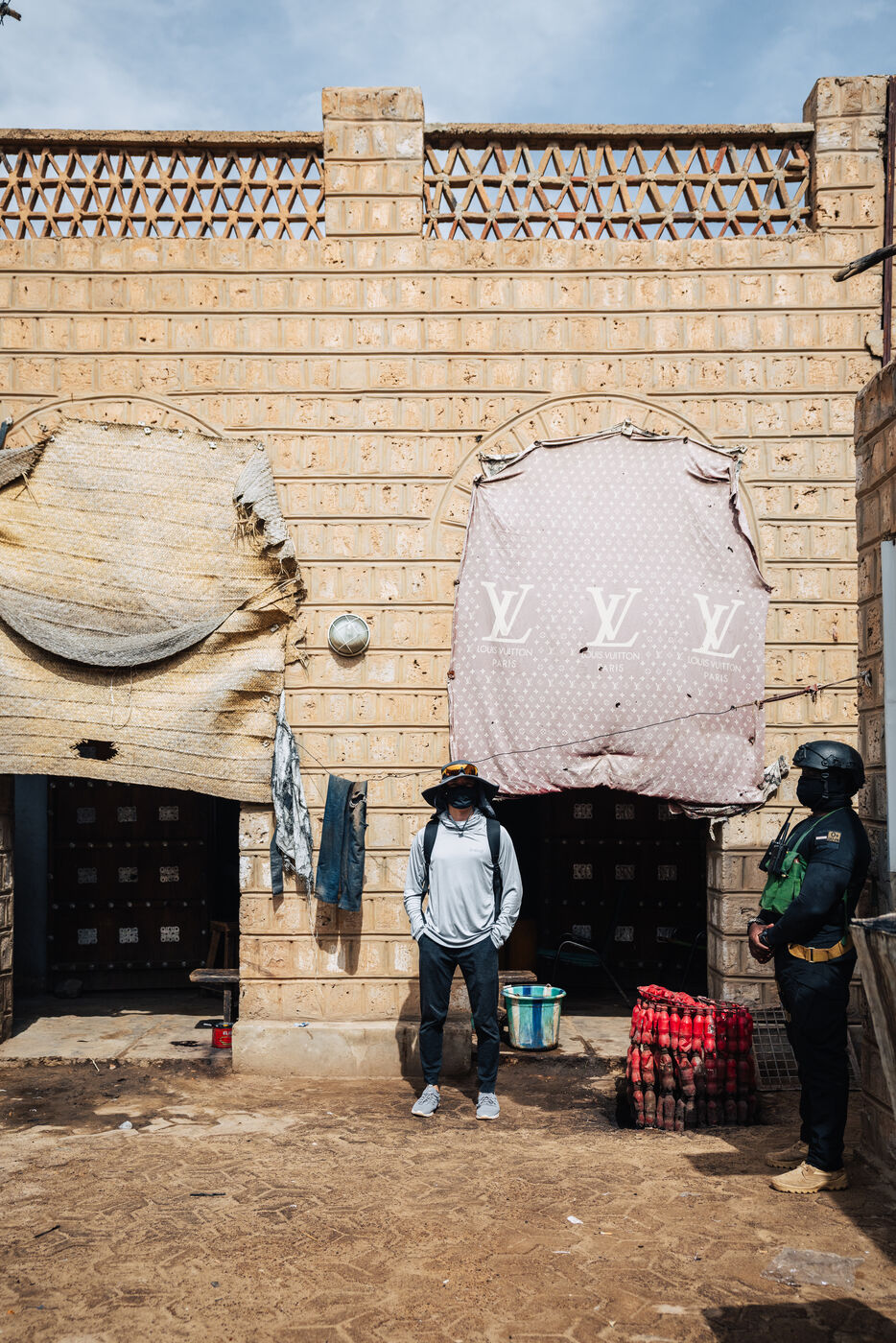 Person standing in front of building
