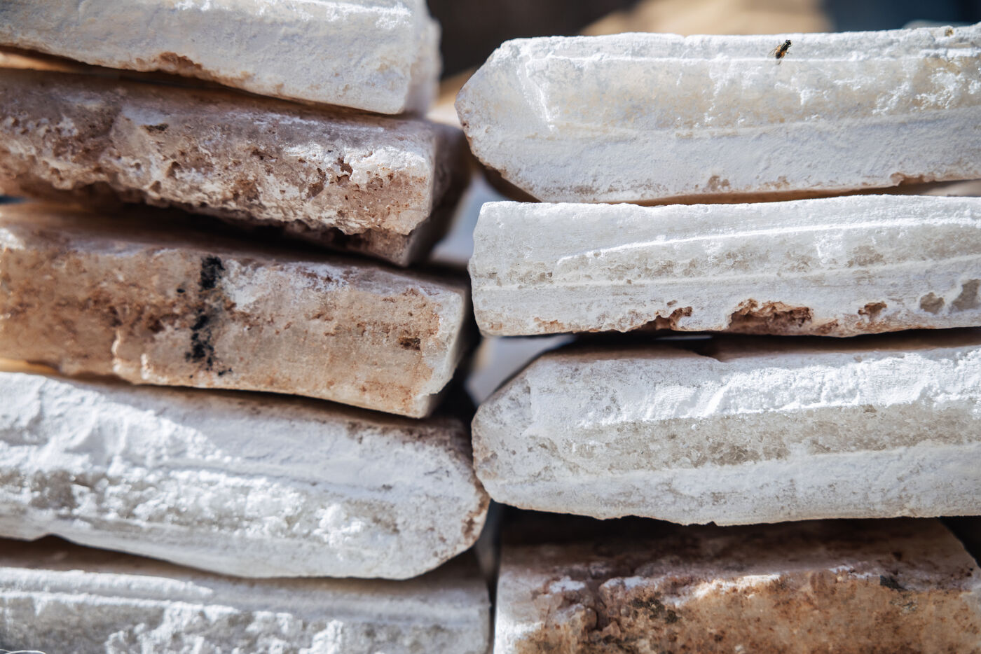Saharan salt slabs stacked in market