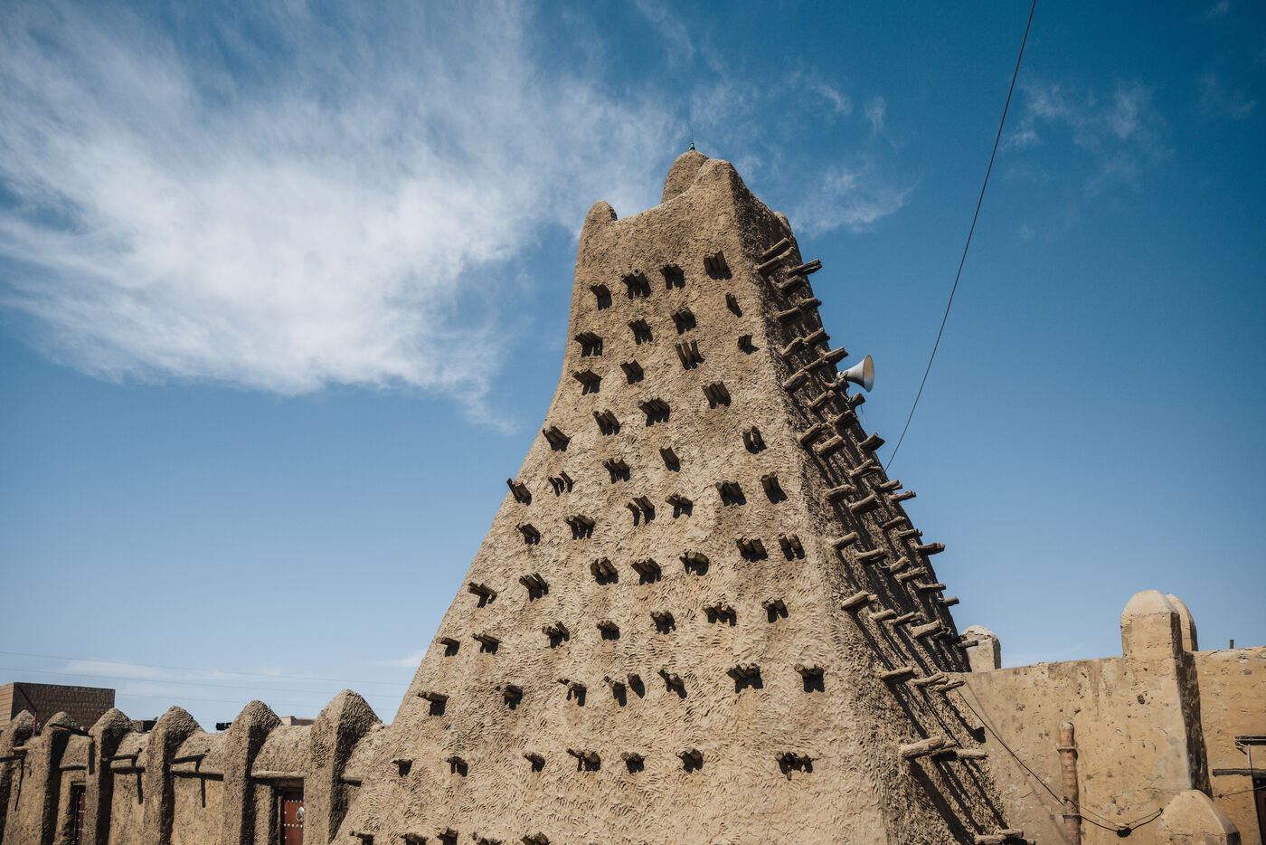 Mosque minaret close-up with toron beams