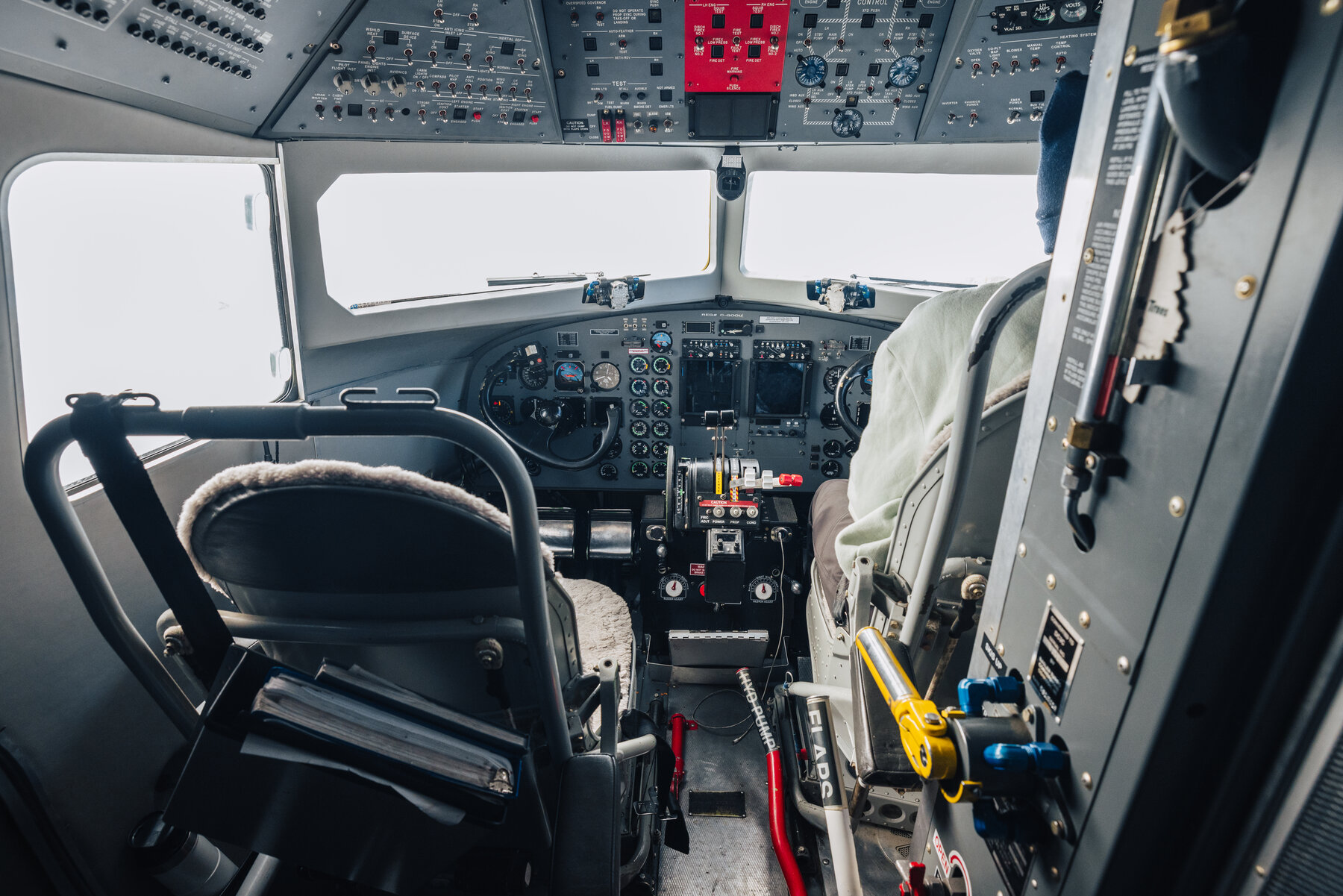 Cockpit of the Basler BT-67 with banks of analog instruments and gauges