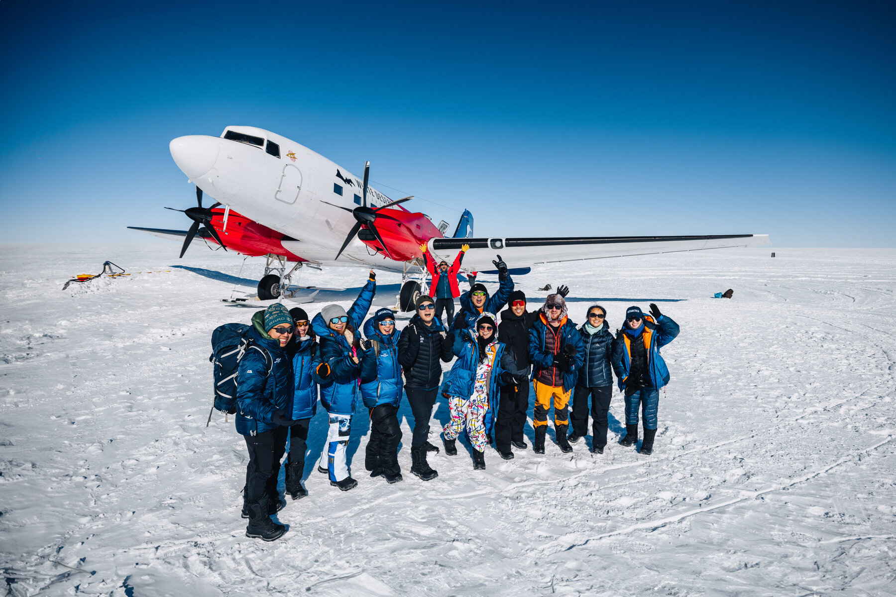 Travelers celebrating together at Dixie's Camp after the day's journey to and from the South Pole