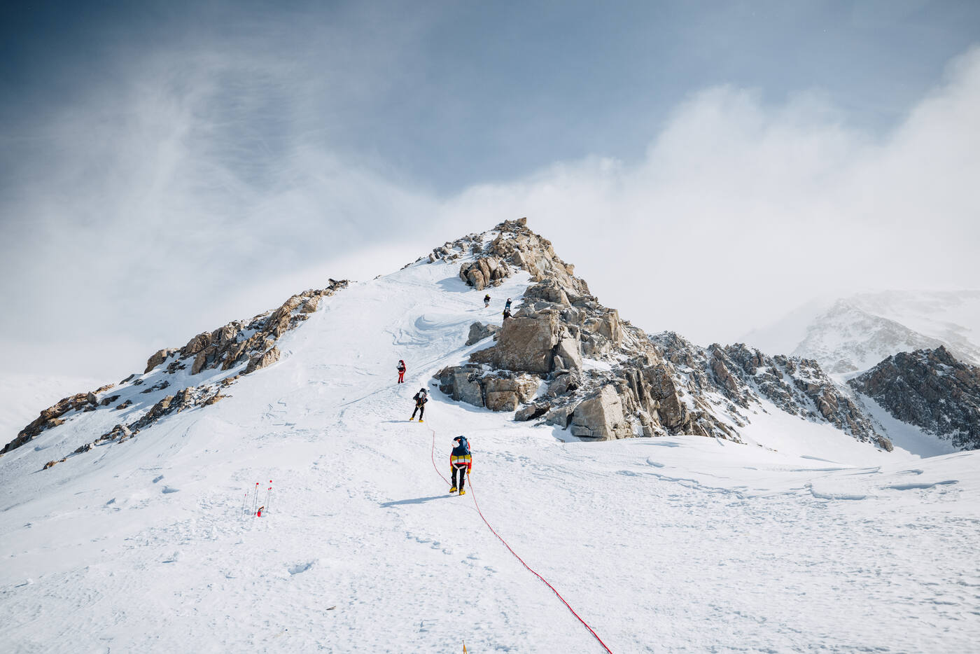 Climber on the exposed 16,000 ft ridge