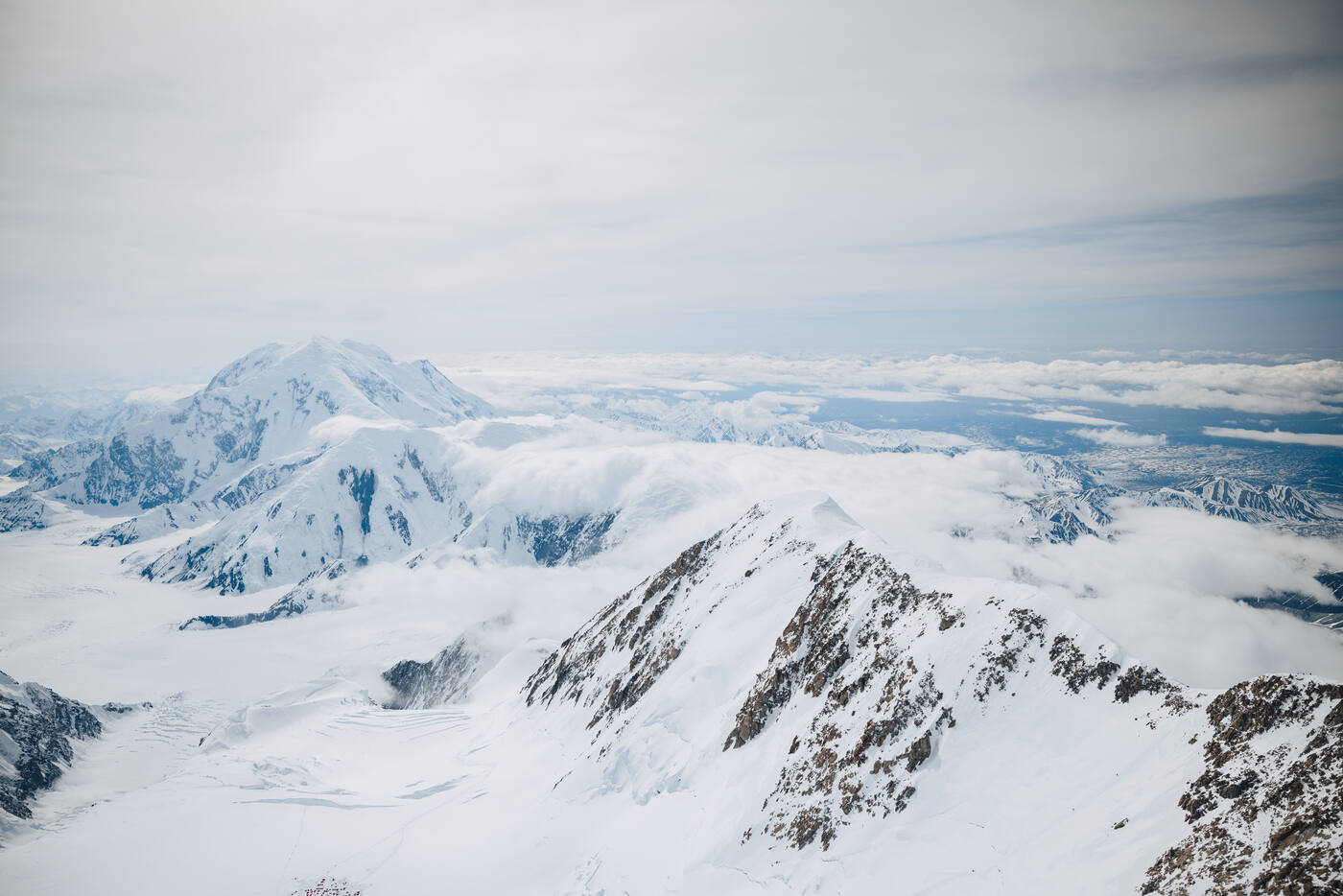 Aerial panoramic view of the Alaska Range from high on Denali, mountains and glaciers stretching to the horizon