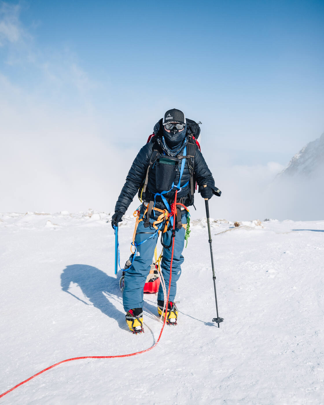 Climbers ascending the steep slope of Motorcycle Hill on Denali