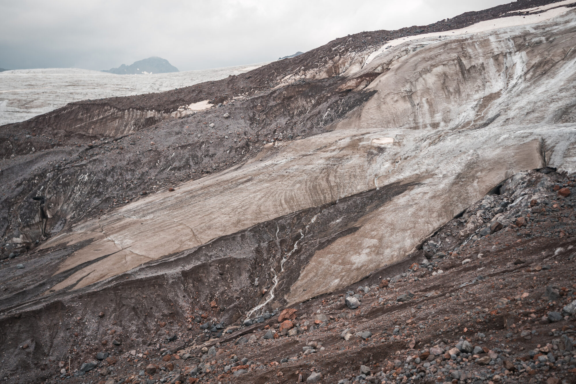 Exposed glacial ice and rock on the Elbrus slopes