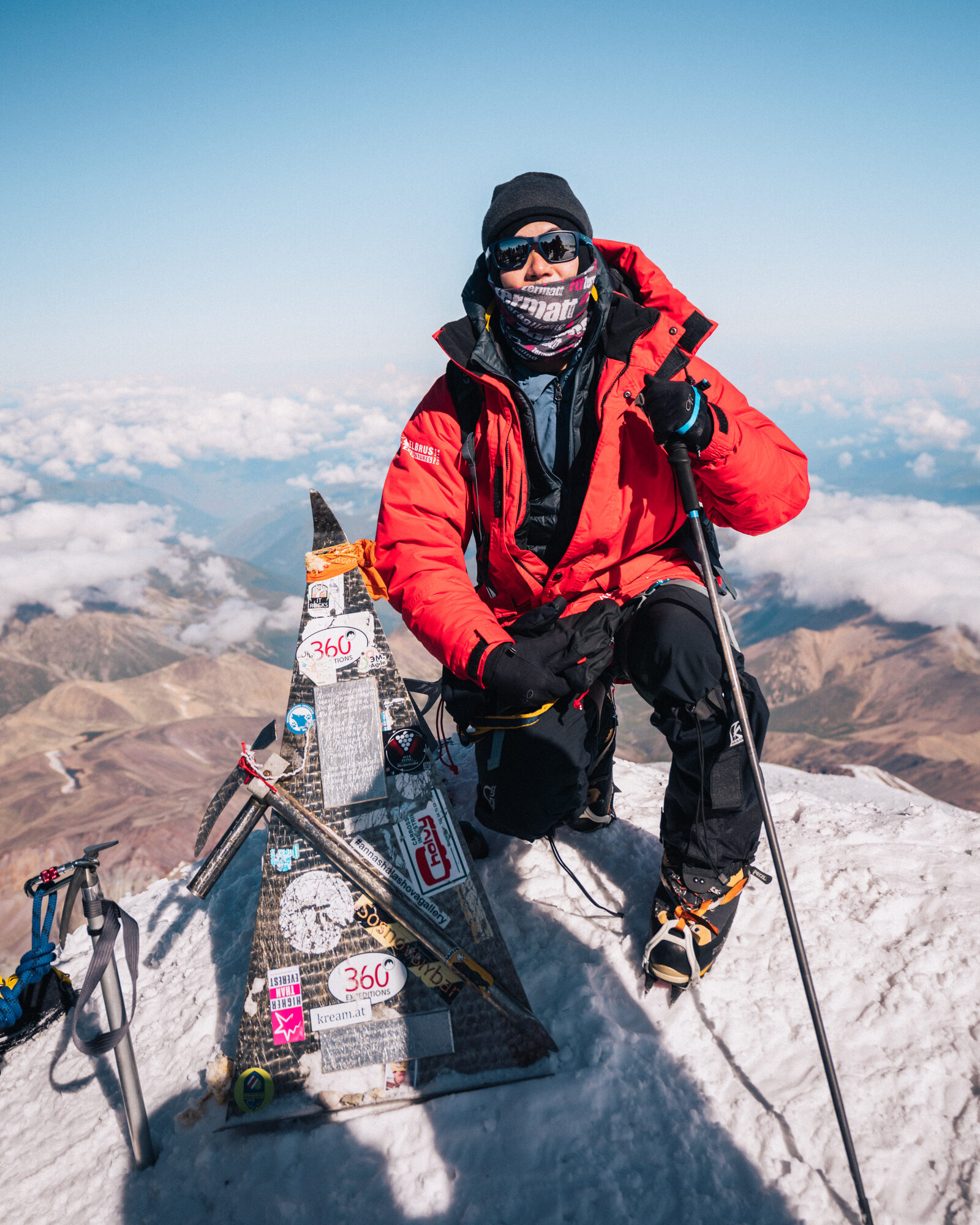 Jason posing at the Elbrus summit marker at 5,642 meters