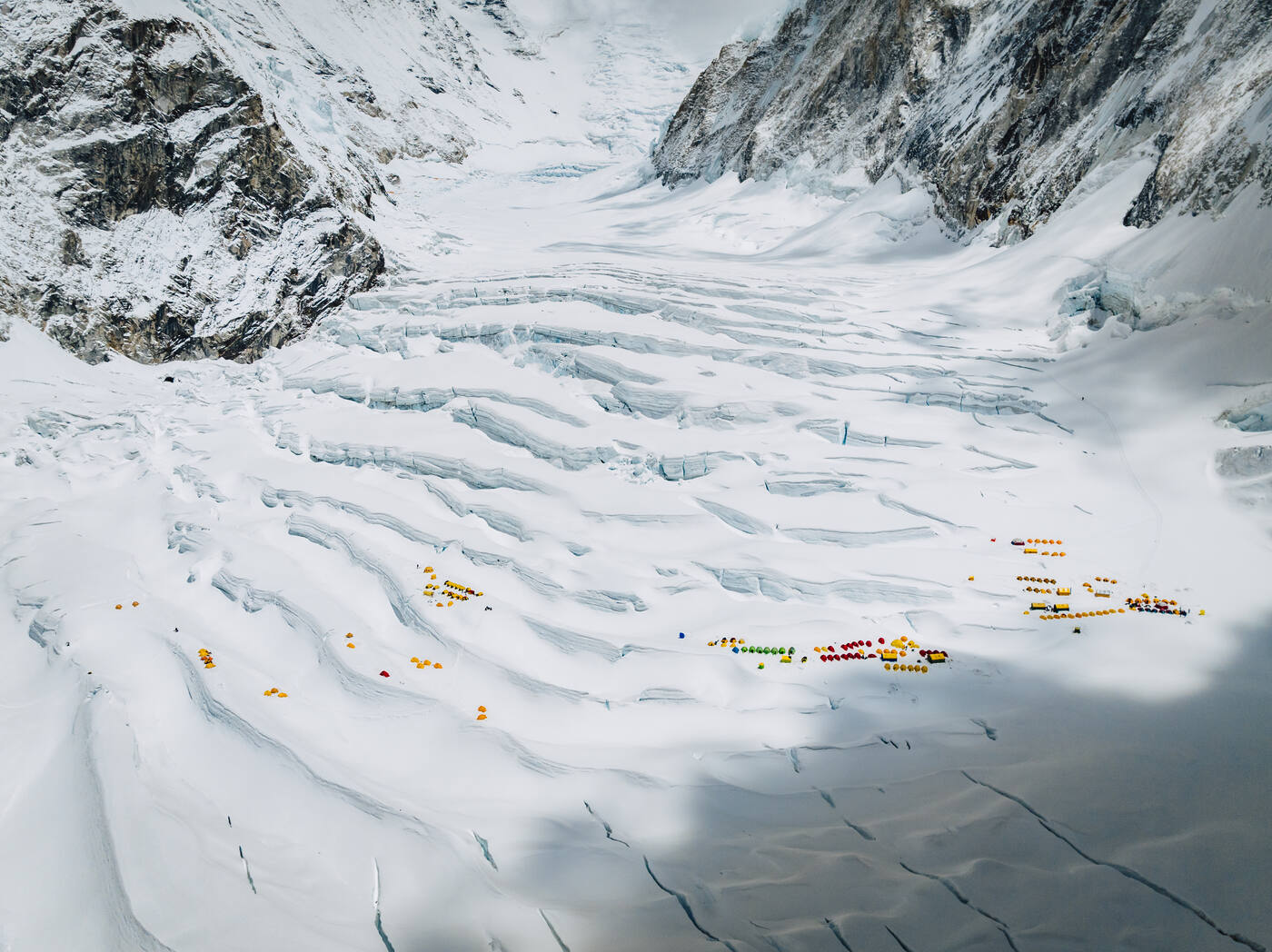 Aerial view of tents on the crevassed snow of the Western Cwm