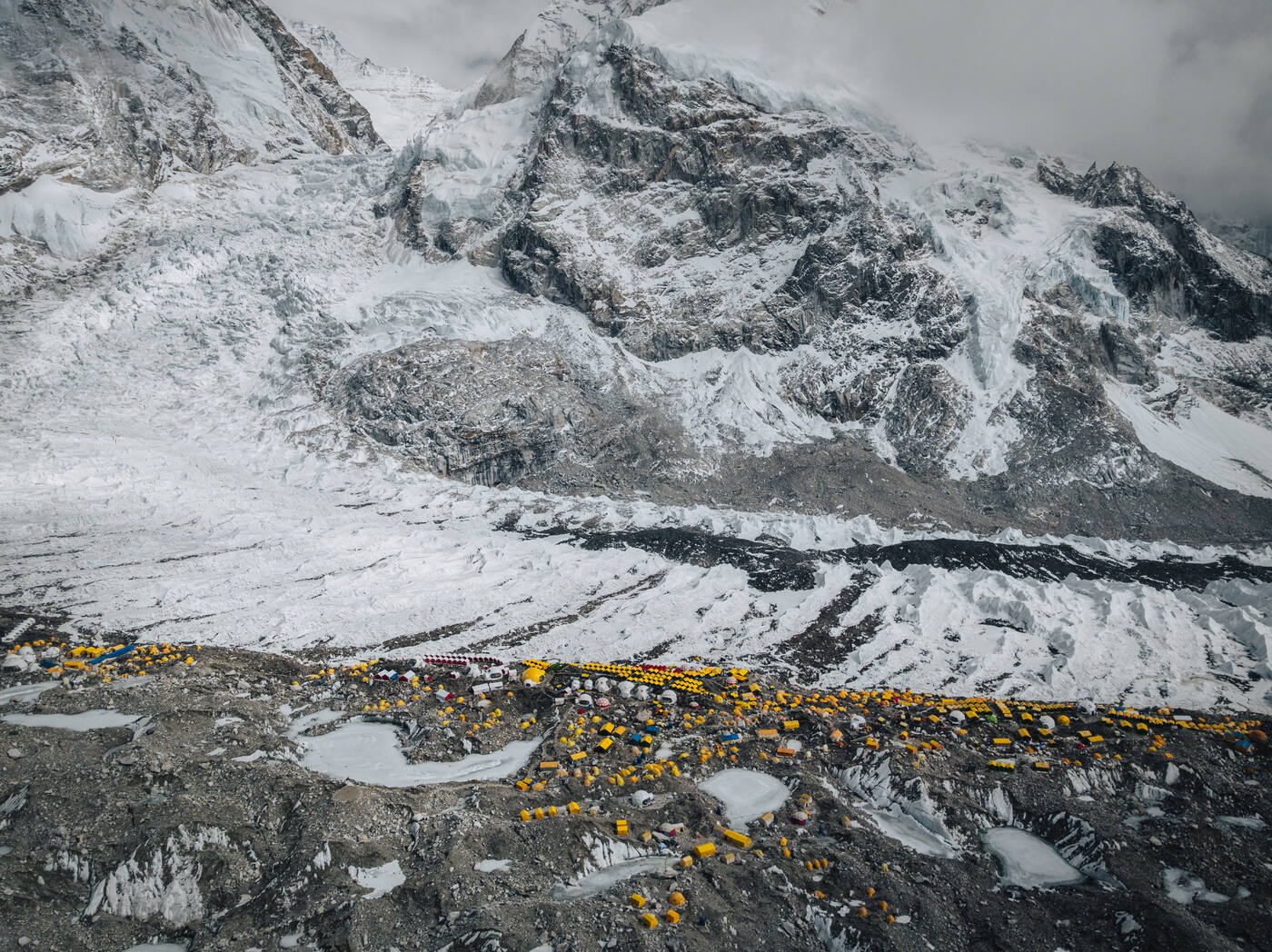 Aerial view of the Khumbu Icefall and Base Camp tents along the glacier