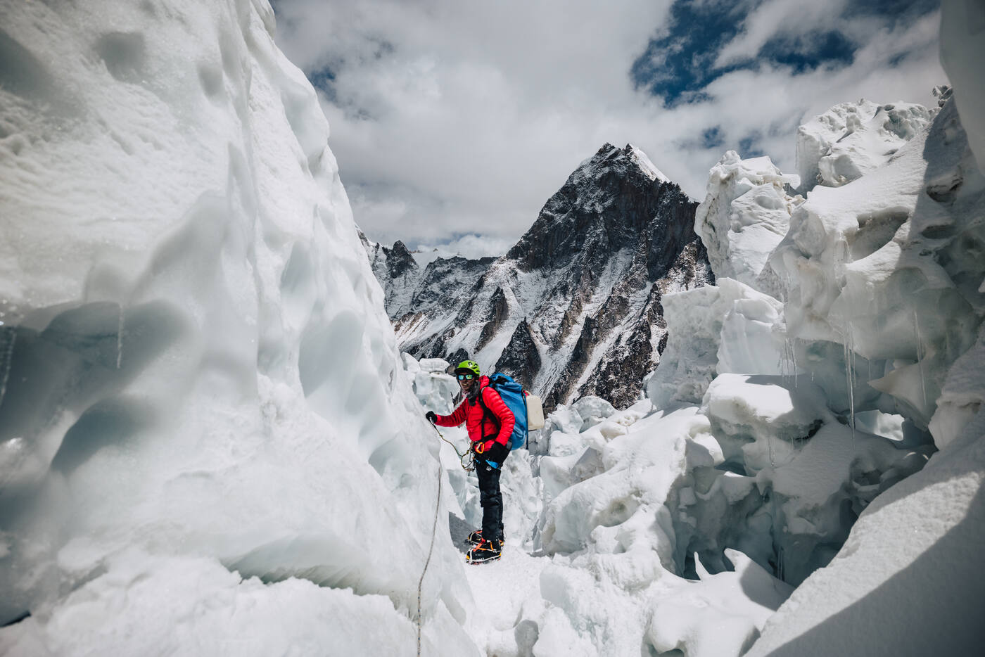 Climber among towering ice seracs in the Khumbu Icefall
