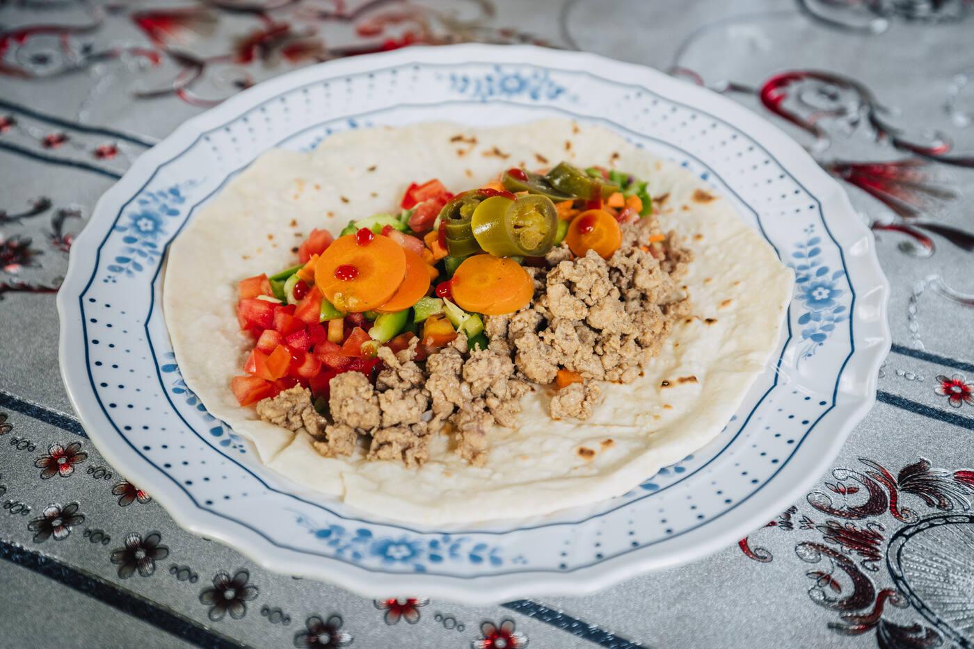 Fresh tortilla wrap with ground meat and vegetables prepared by the kitchen crew at Everest Base Camp
