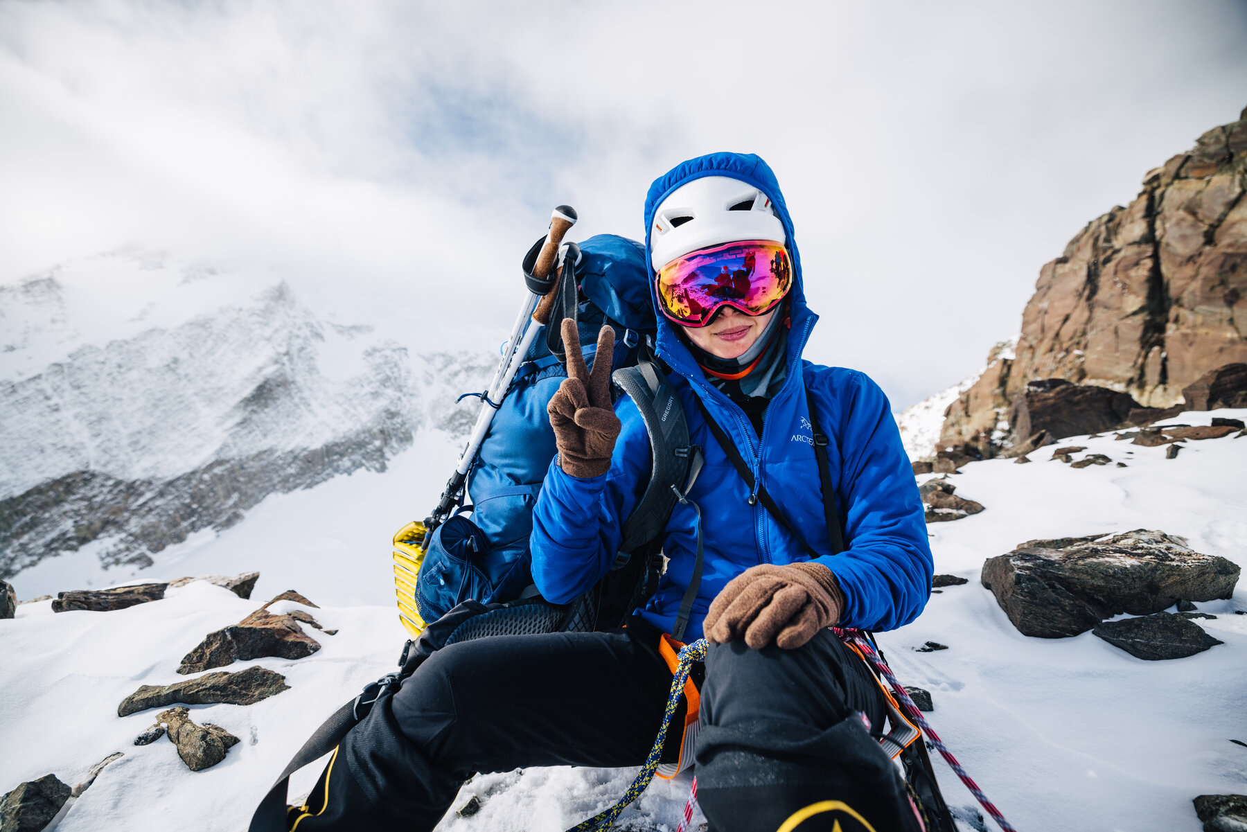 Close-up portrait of climber at altitude on Vinson with goggles and expedition gear