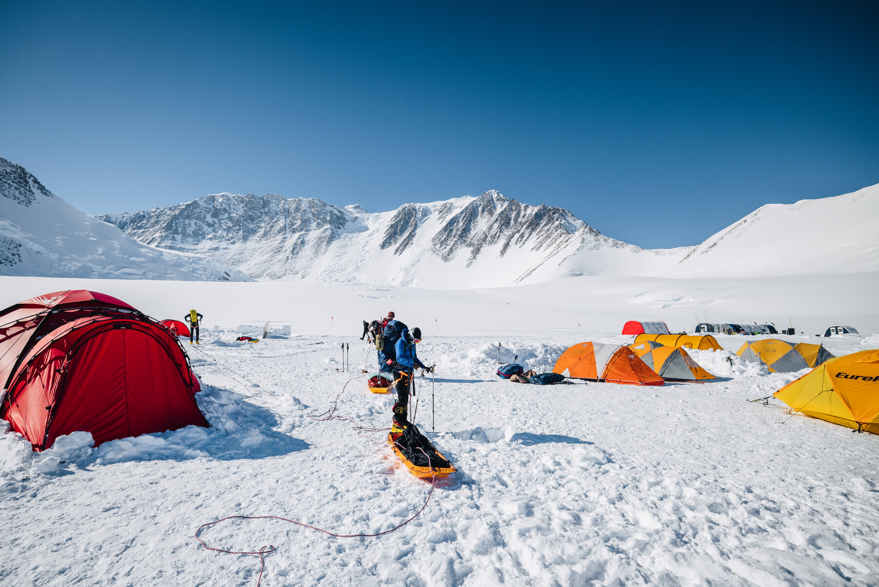 Tents being set up at Low Camp on the Branscomb Glacier